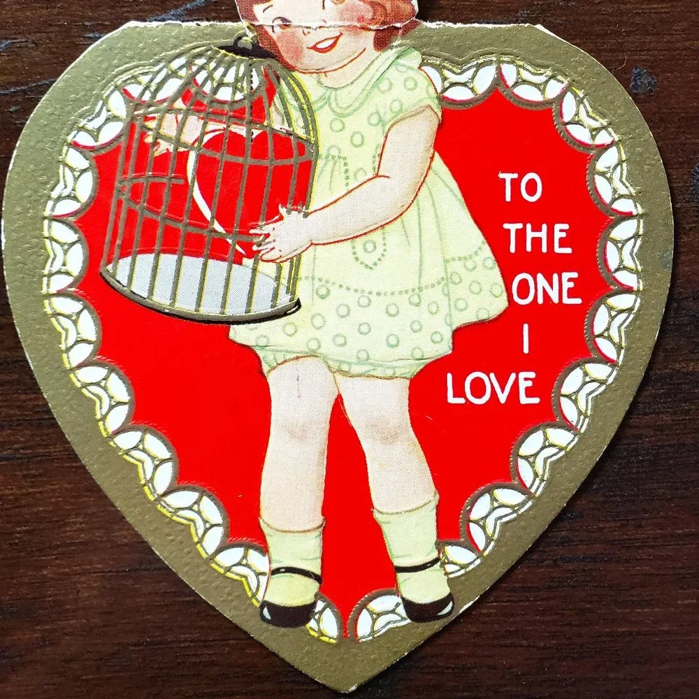 1940's Die Cut HEART SHAPE GIRL HOLDING CAGE Valentine's Day Card
